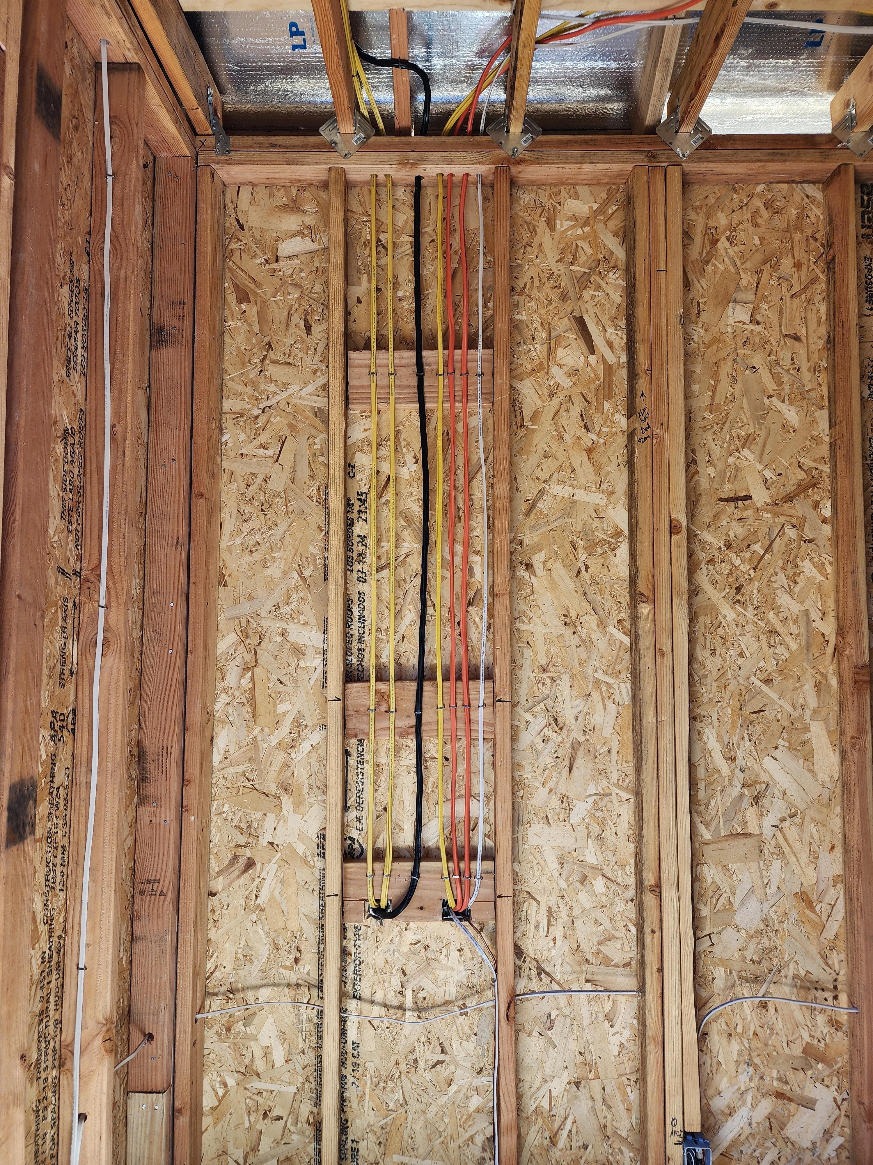 Neatly run electrical branch circuits during a PR Electric rough-in